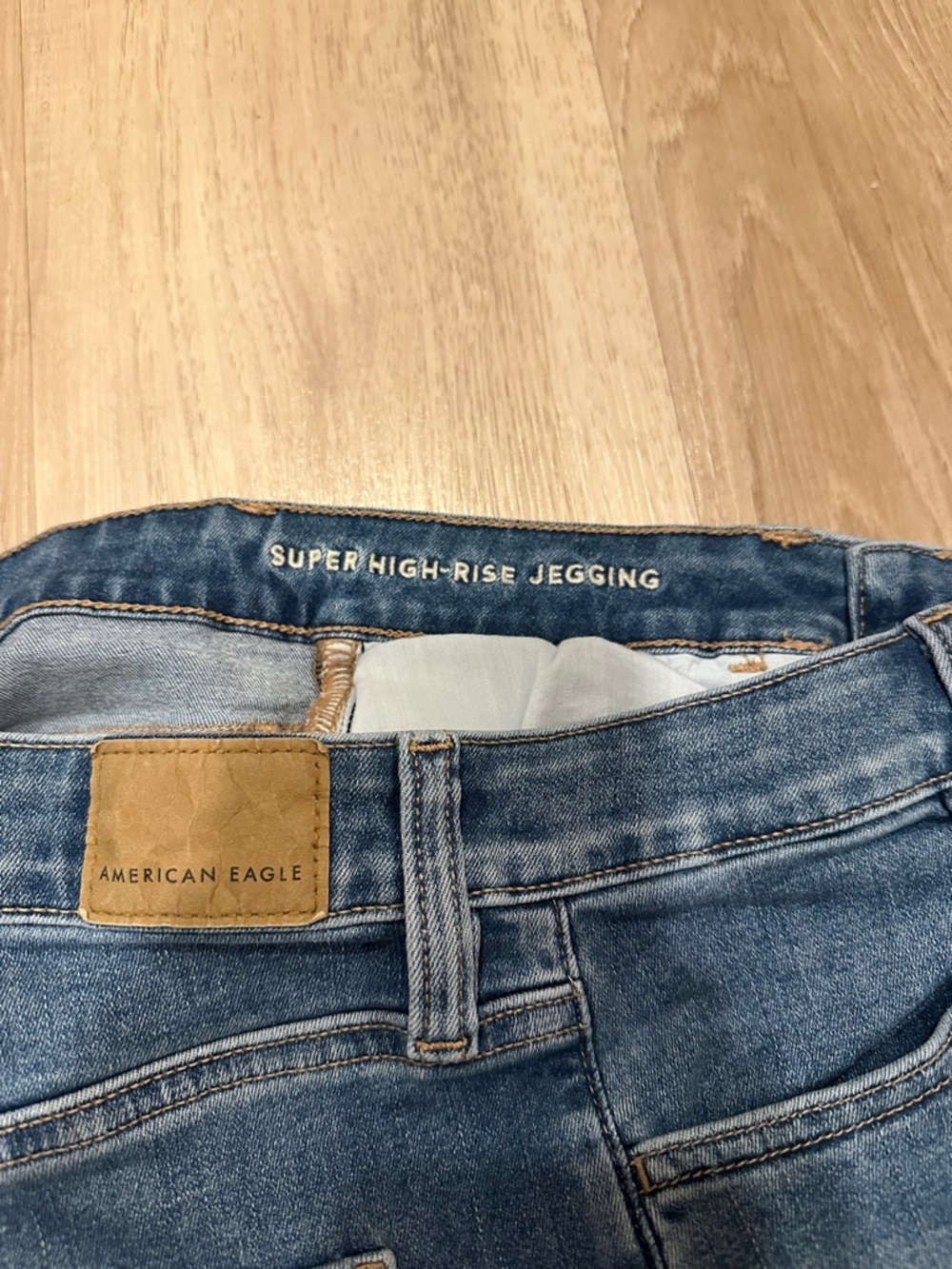 American Eagle Outfitters Super High-Rise Jegging - Light Blue and Tan Patch
